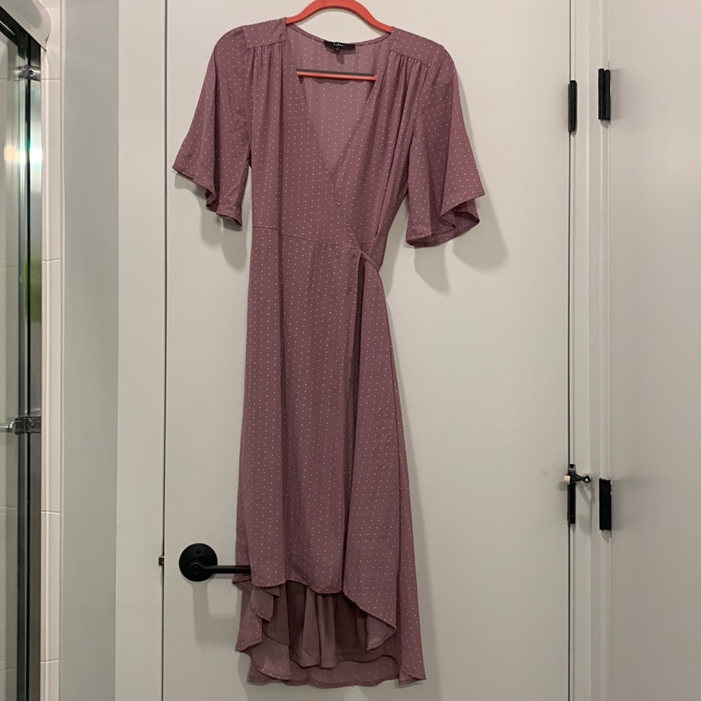 Mauve patterned wrap dress mid length.
